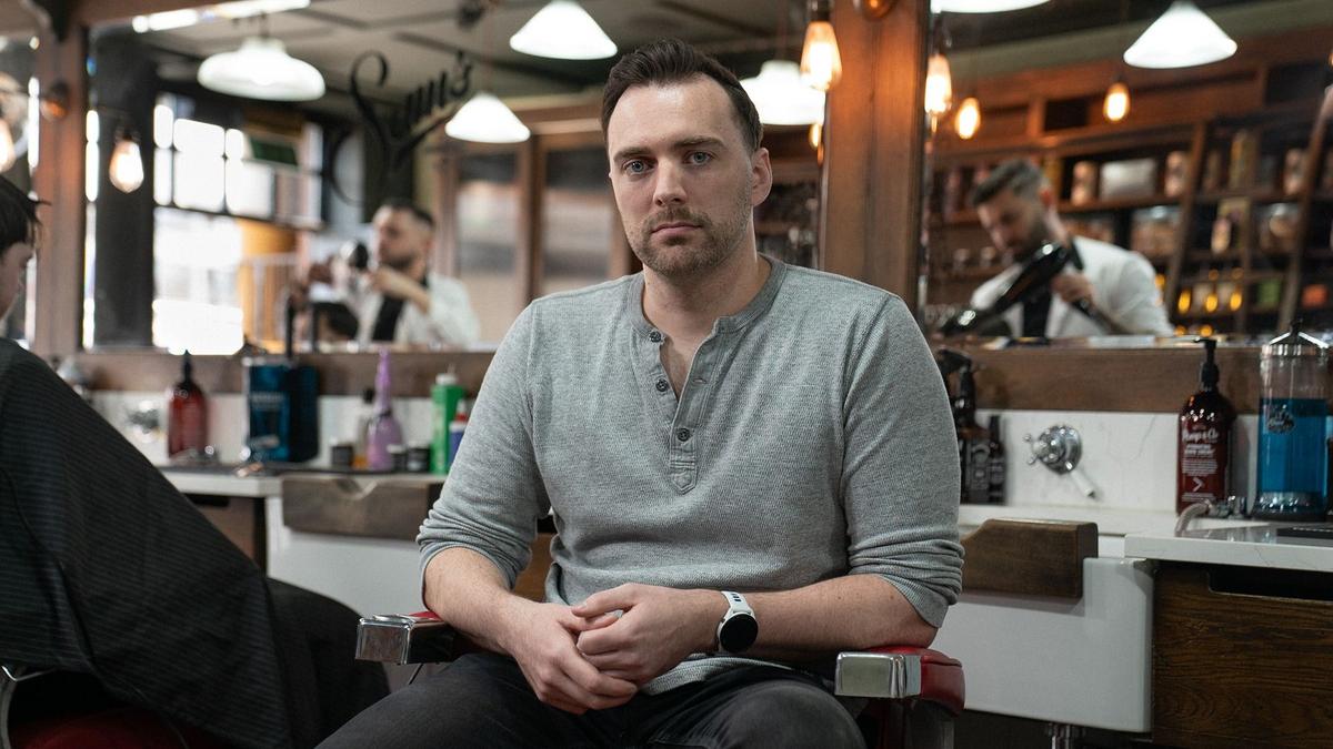 Mo bro, Conor, sat in a barber chair