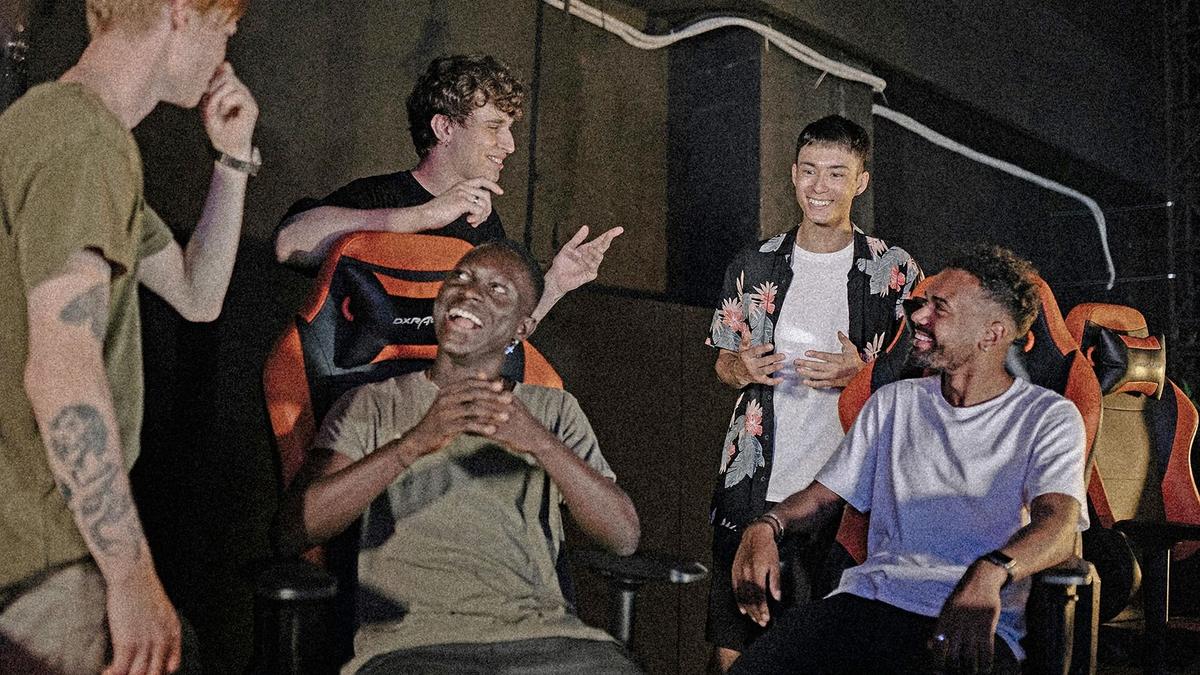 Group of young men talking