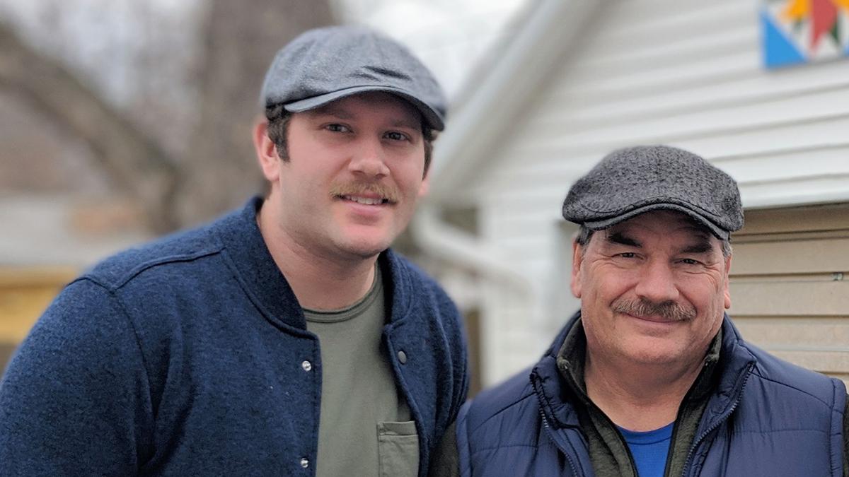 Father and son sporting matching moustaches