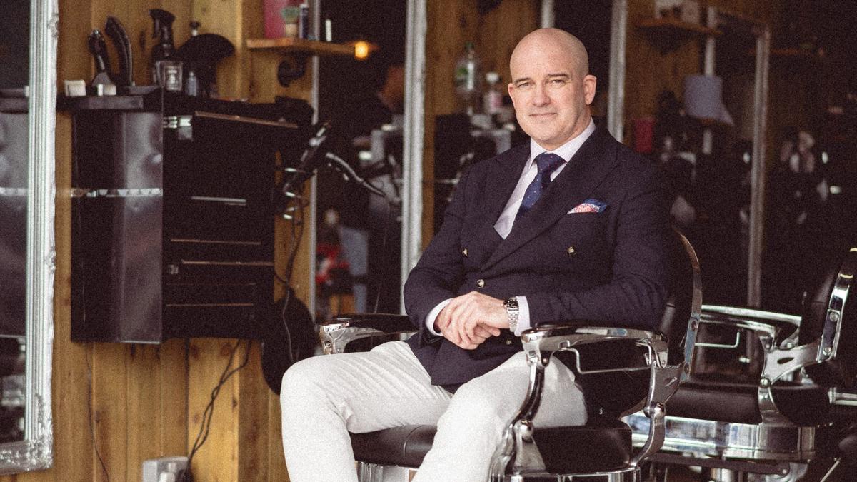 man in barber chair