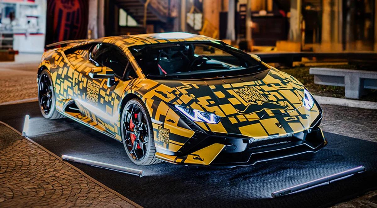 Lamborghini Huracán Tecnica wrapped in QR codes and Movember branding. 