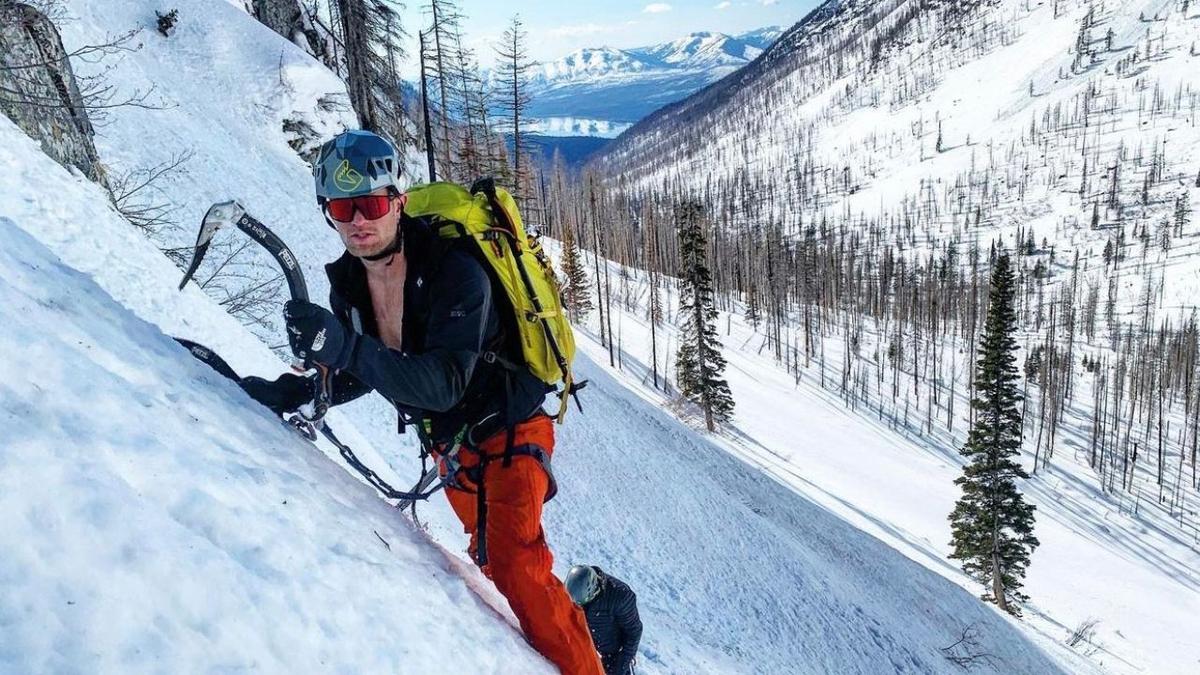 Man Climbing a Mountain
