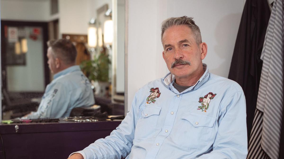 man in a barber chair