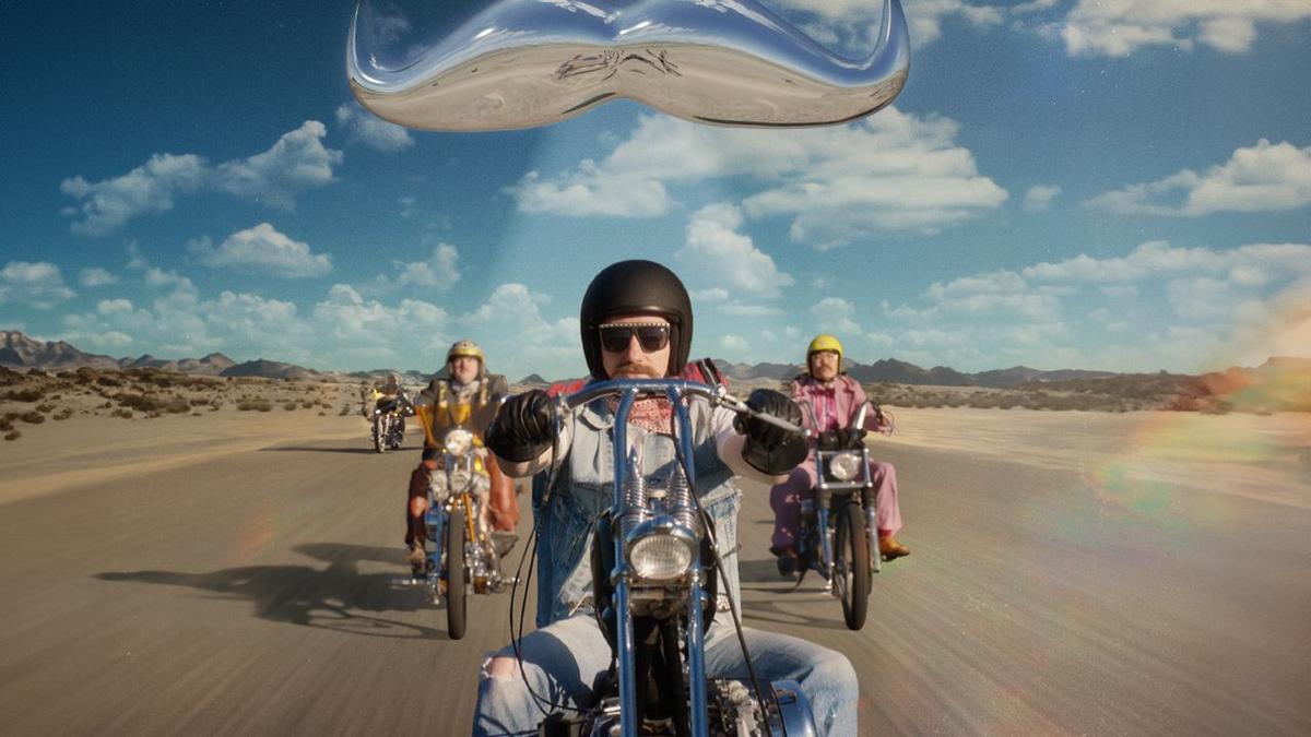 A convoy of moustachioed motorcyclists.