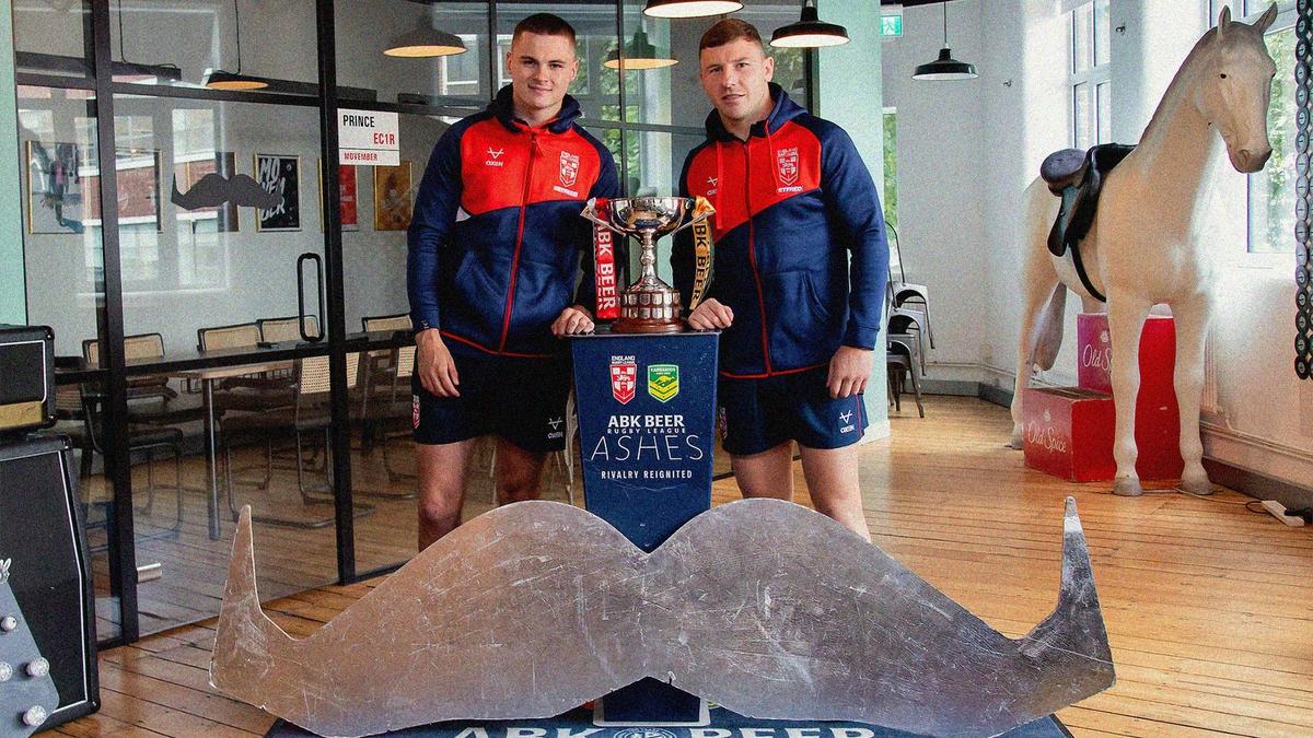 Rugby players at Movember office for the partnership