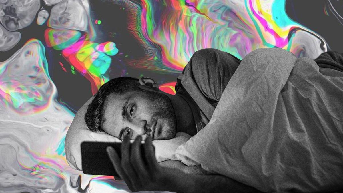 A man sleeping in a bed.