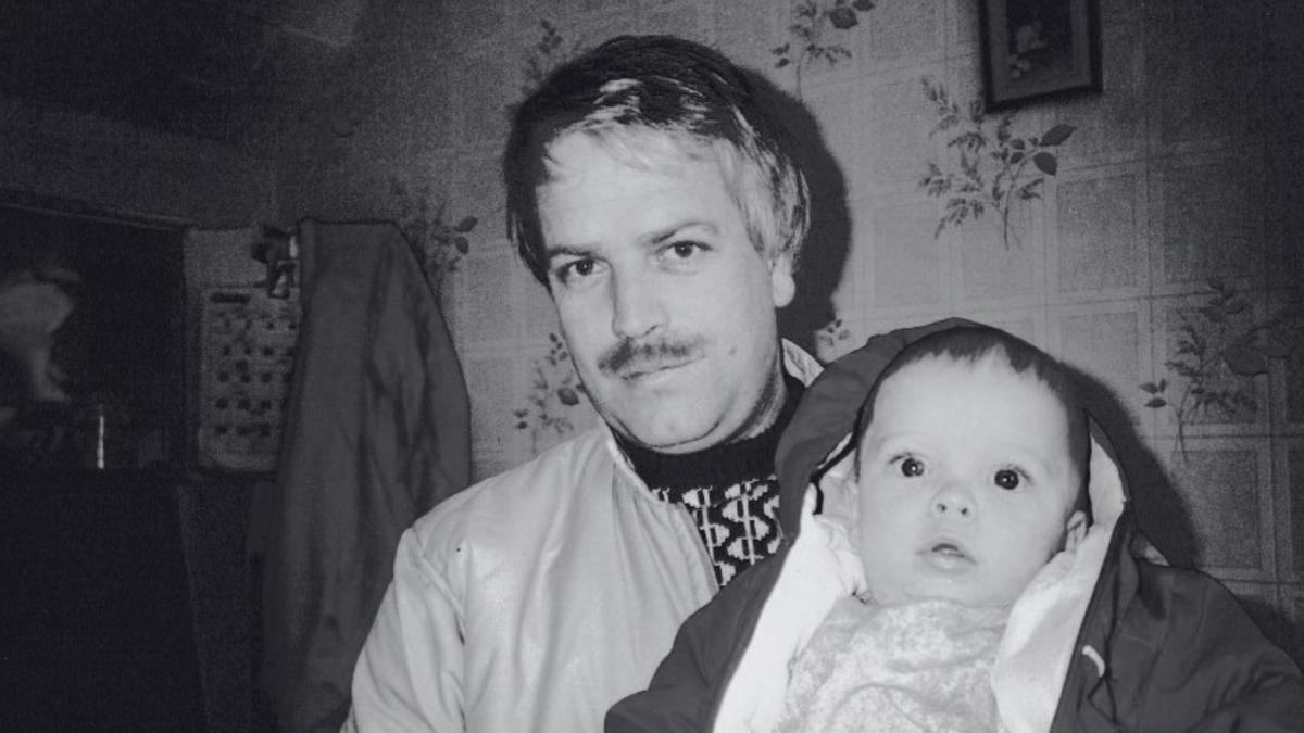 Peter as a baby in his father's arms