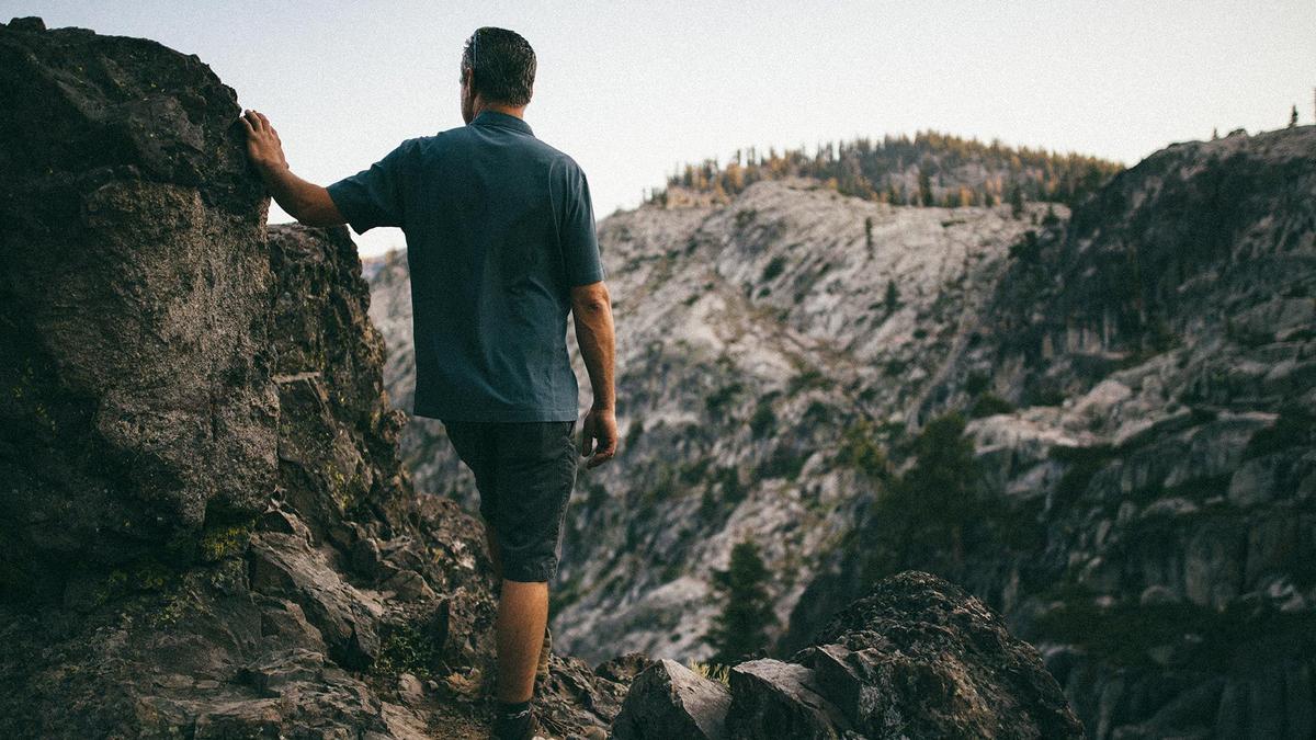 A photo of a man on a hike