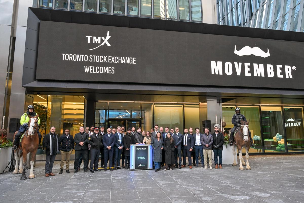 A group of Movember fundraisers stand outside the Toronto Stock Exchange