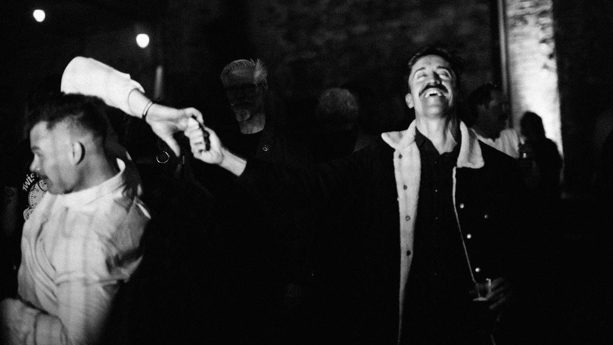 Two Mo Bros dancing and celebrating. 