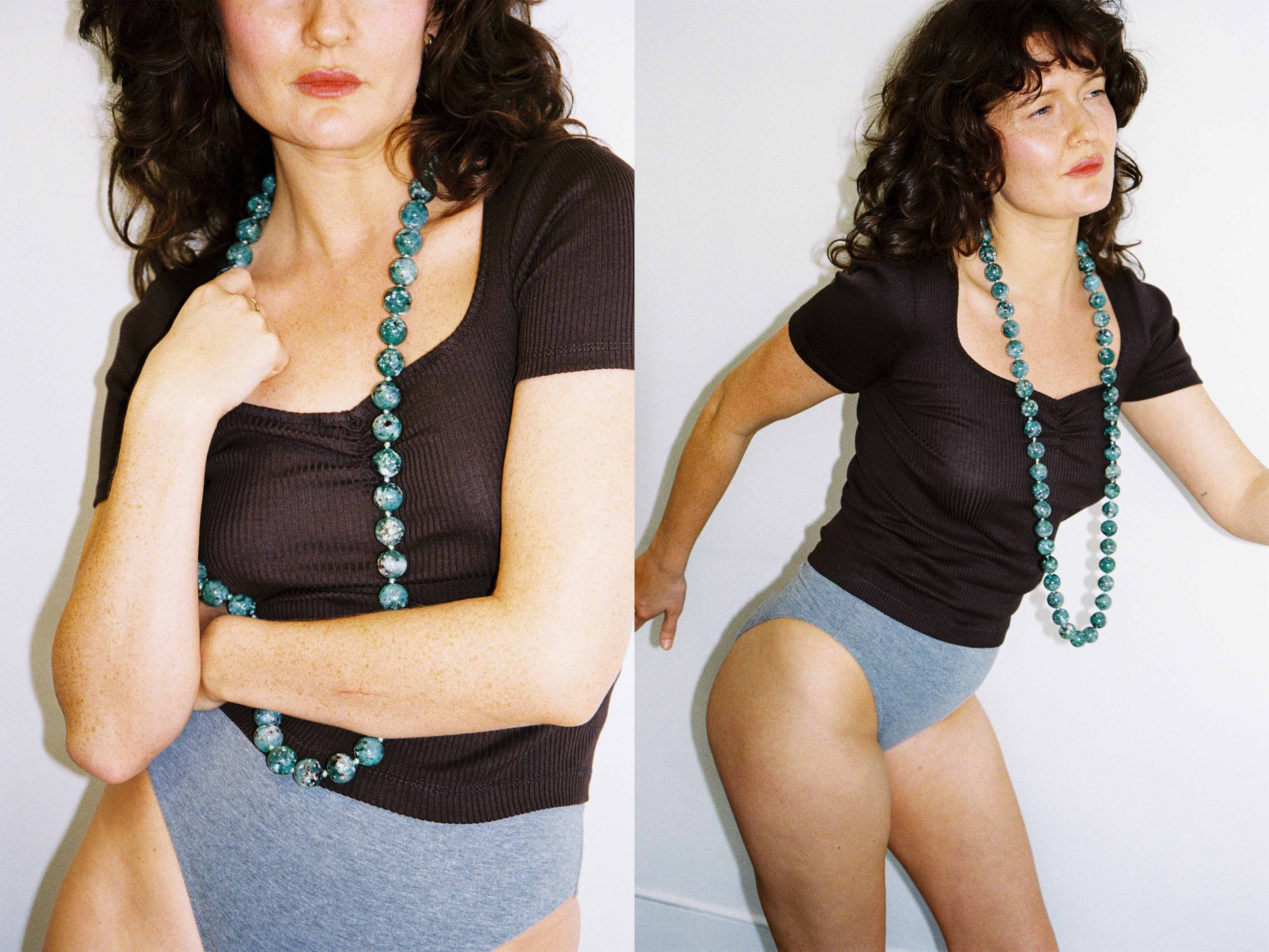 Model wearing cocoa Swan tee