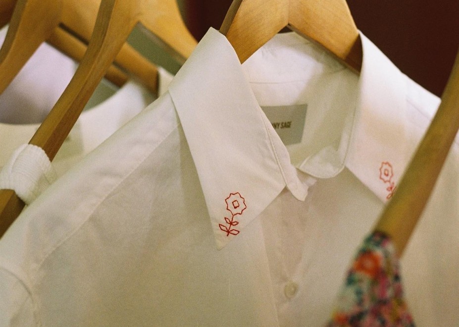 White shirt with red embroidered flower