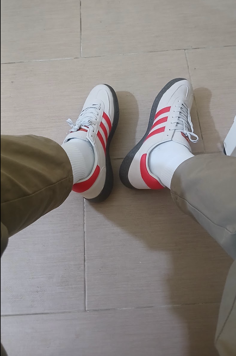 Red Adidas spazials.