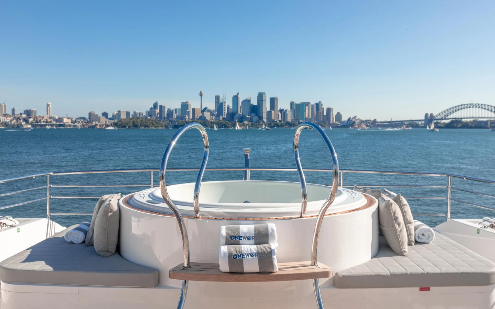 ONEWORLD foredeck jacuzzi against the Sydney skyline
