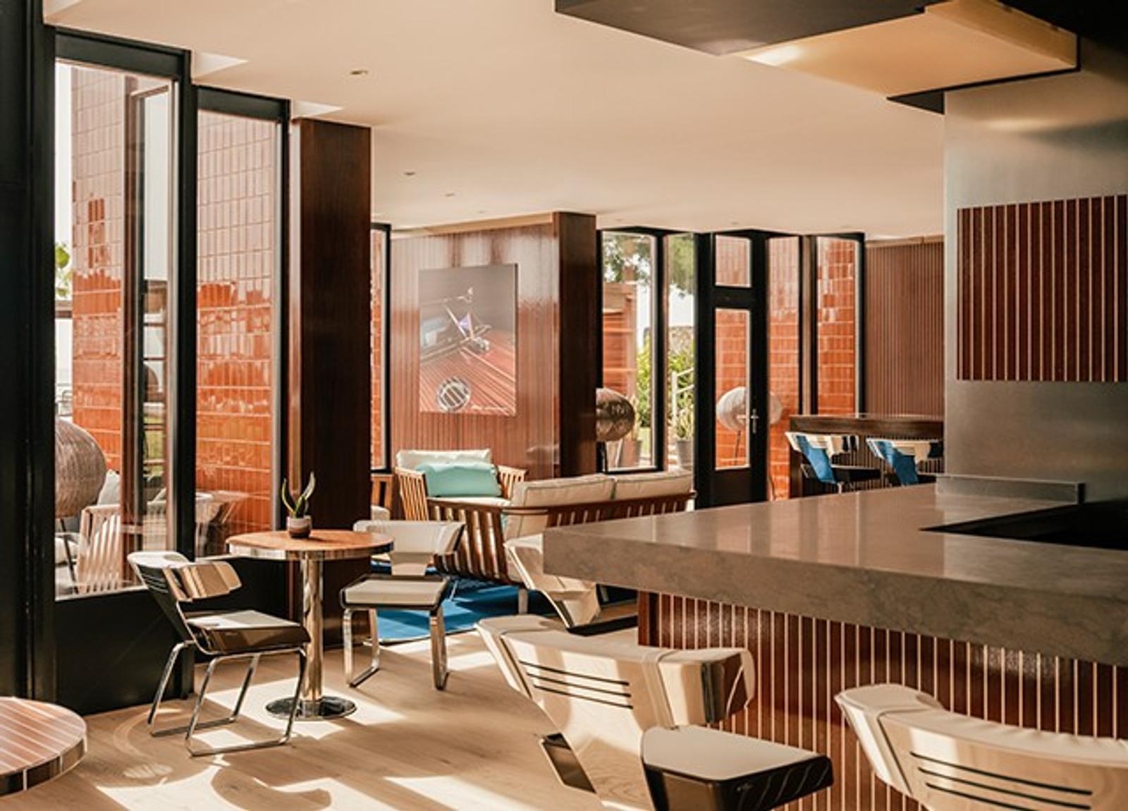 The Riva Lounge — mahogany, ribbed maple and polished steel above the Mediterranean