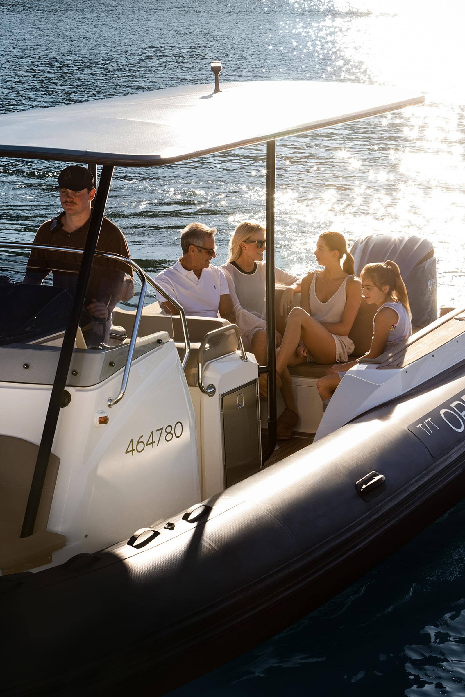 Guests on the tender crossing to the yacht