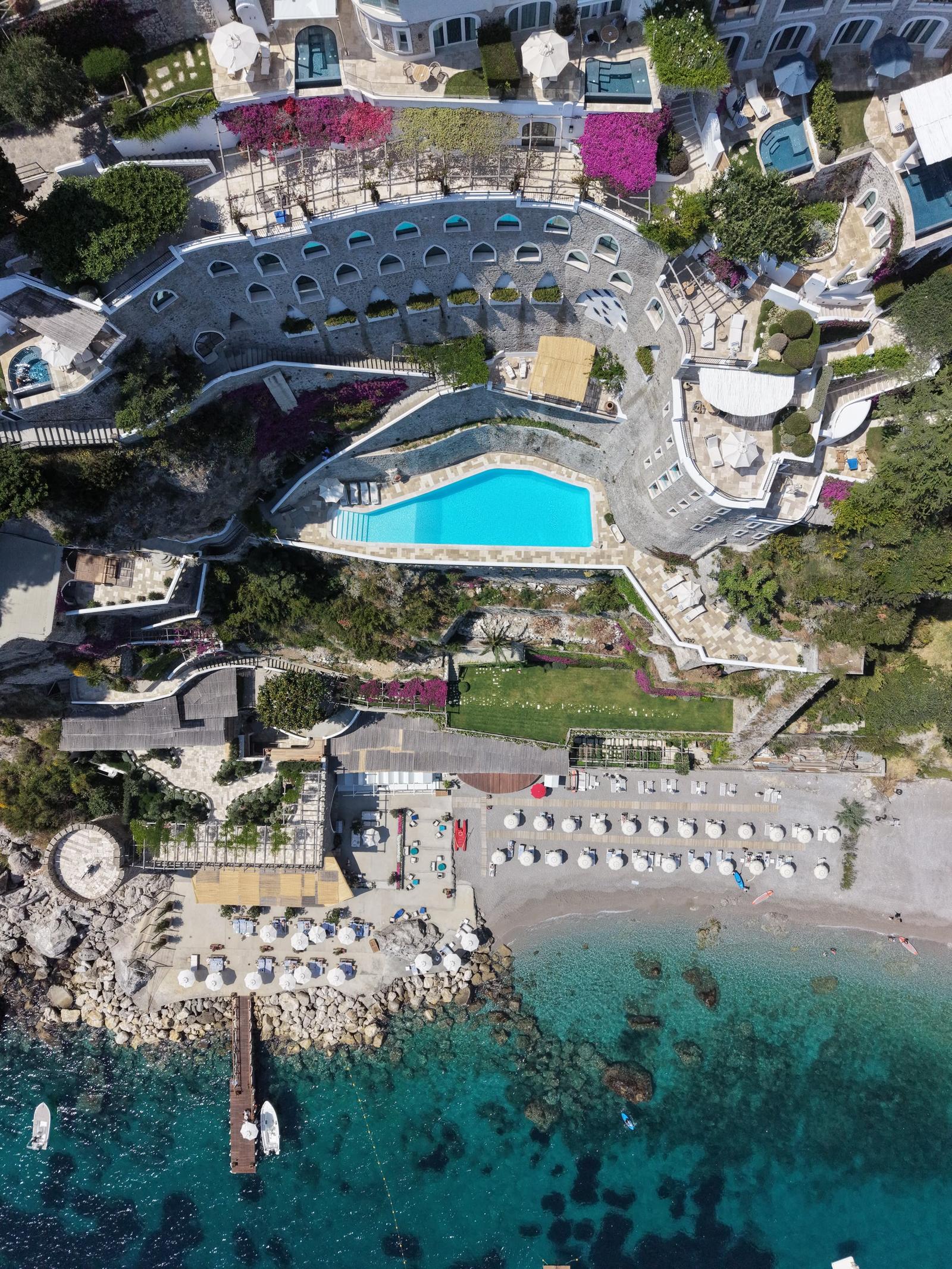 Overhead view of Borgo Santandrea, its pools and private beach