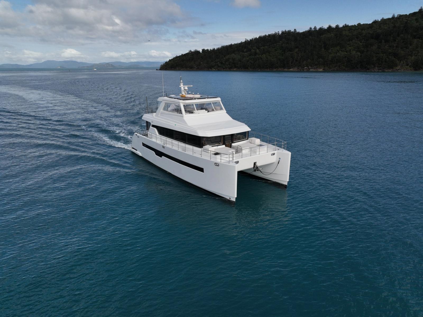 The catamaran under way through the island passage