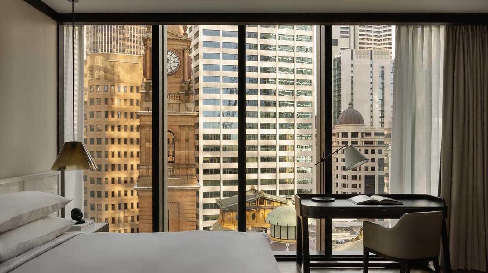 A Tower Room at dusk, facing the sandstone clock tower