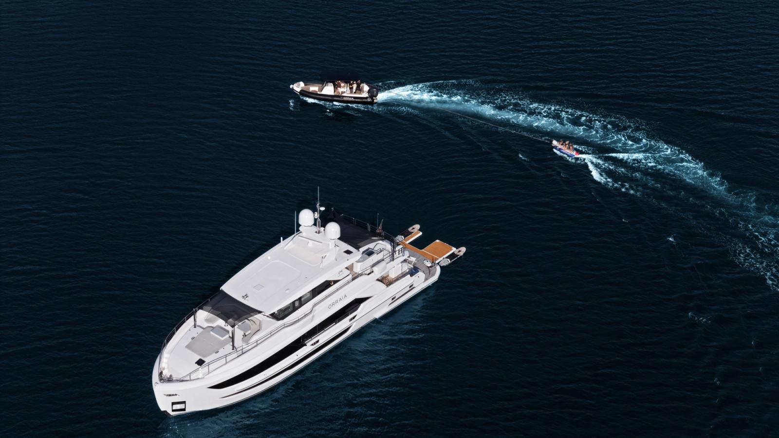 ORRAIA underway with her tender