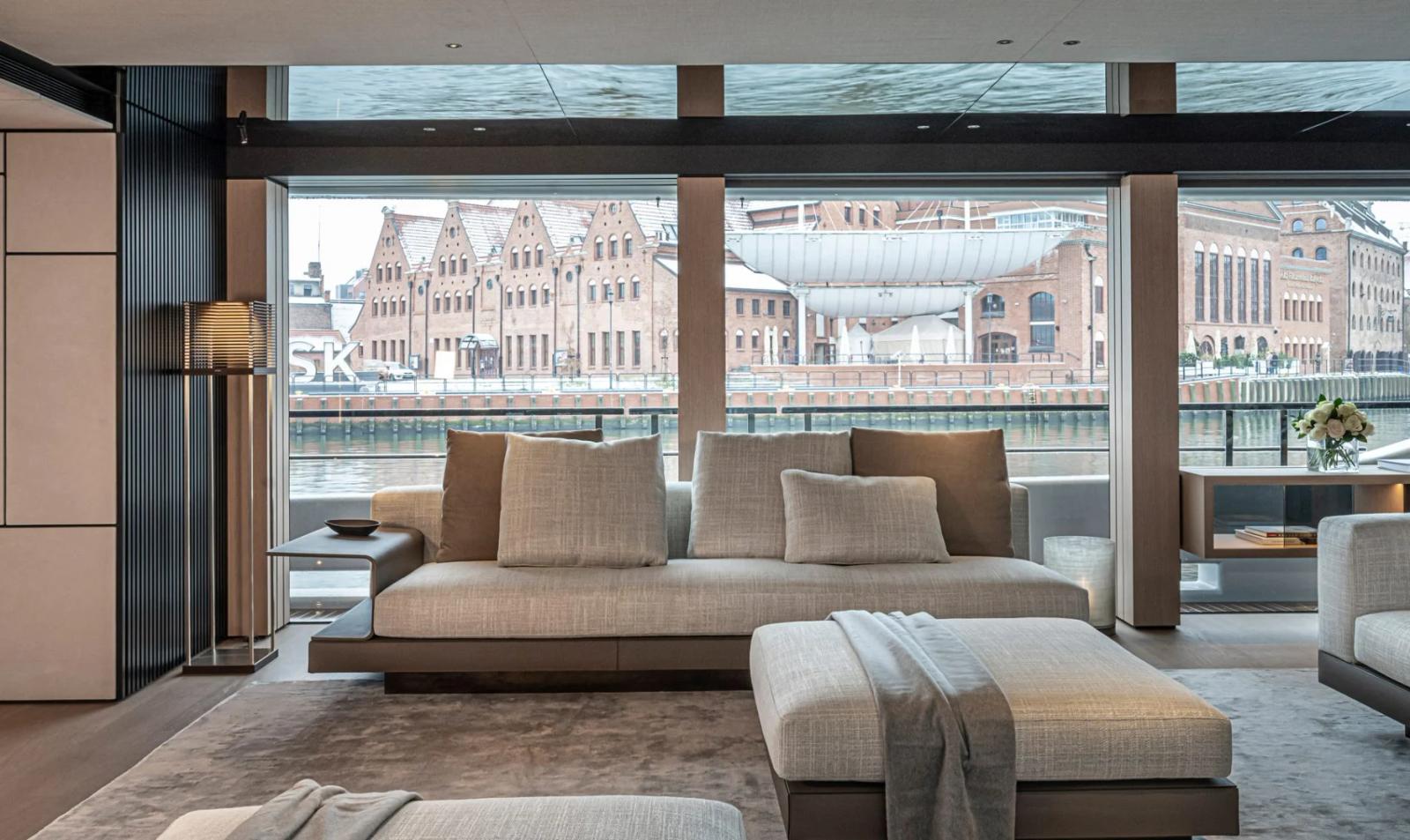 Ace — main salon sofa quayside view