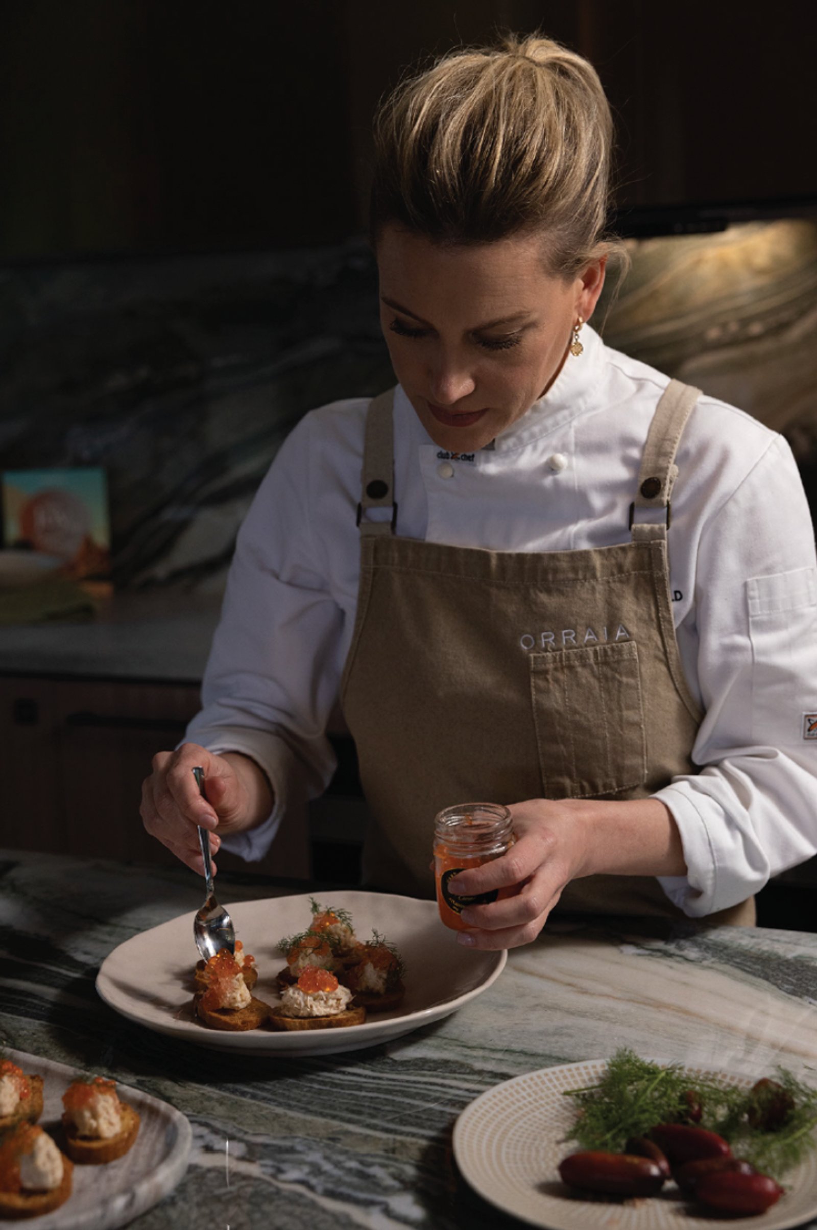 Private chef plating on board