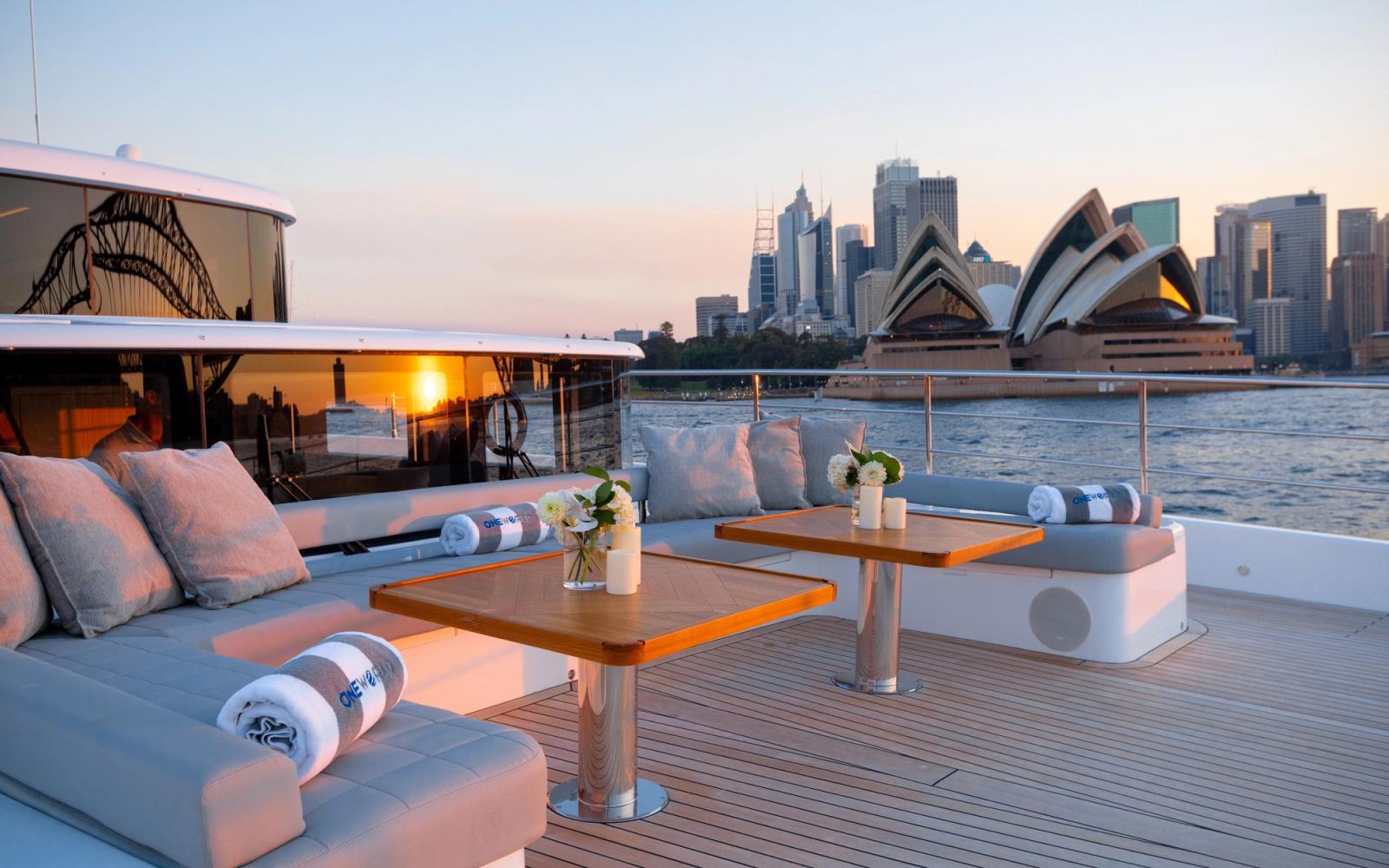 ONEWORLD — aft deck at dusk