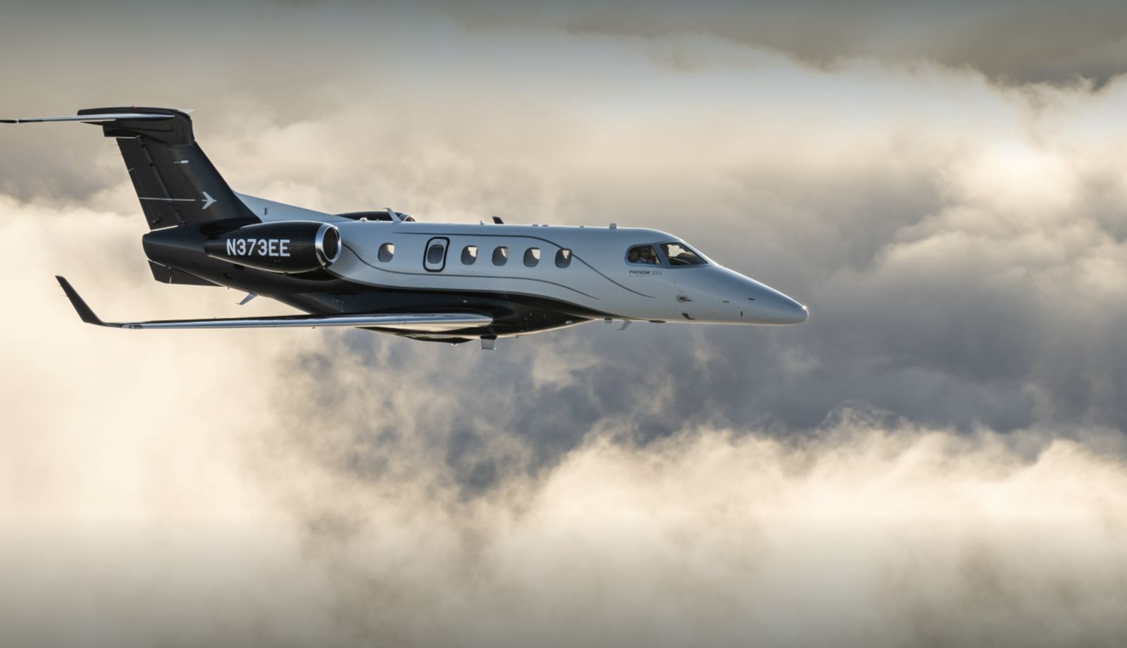 Embraer Phenom 300, a light jet private jet available for charter with ORRAIA