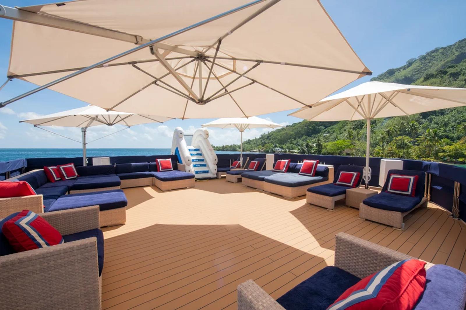 ARCTIC — sun deck umbrellas loungers