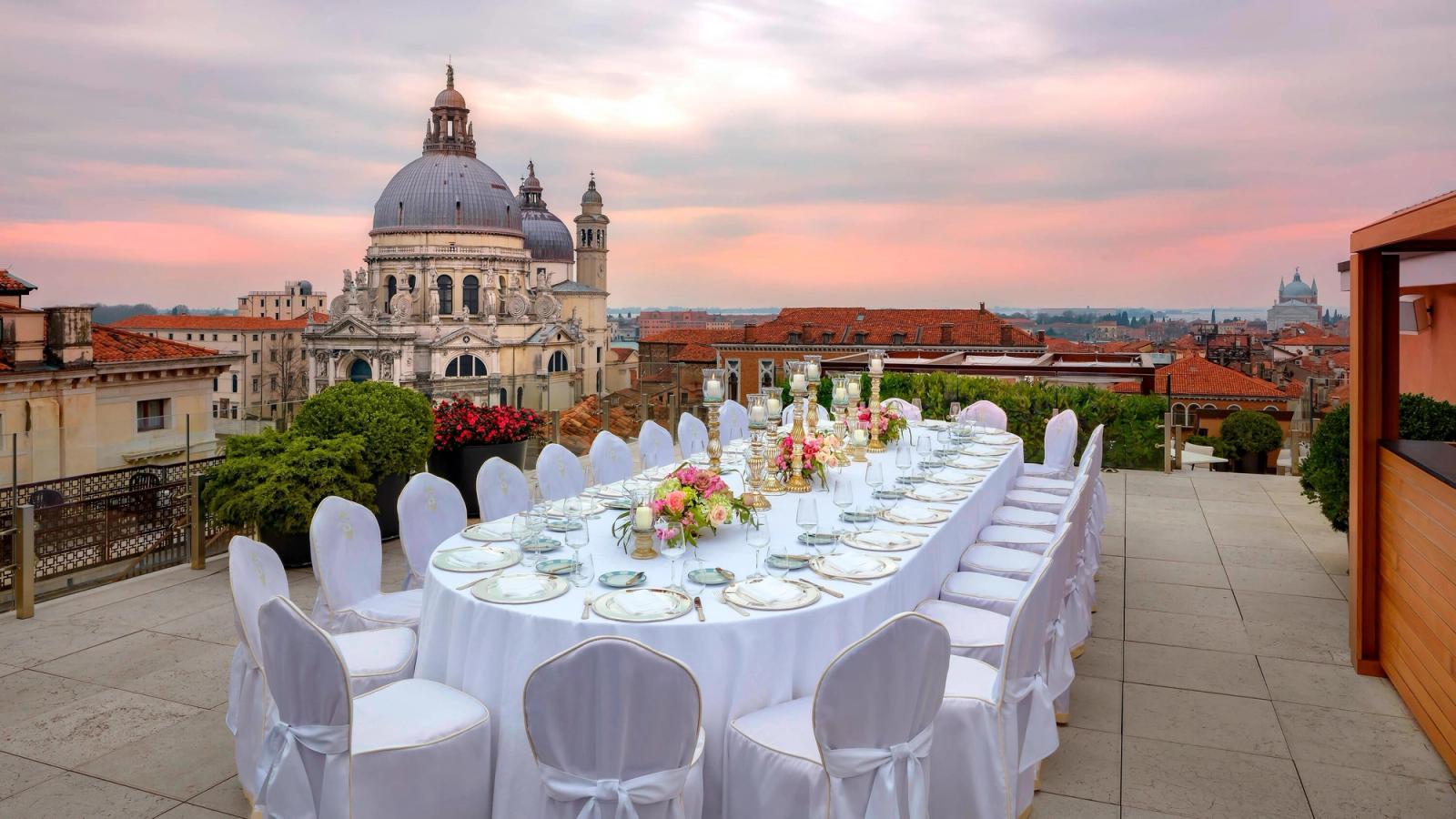 Dinner on the Redentore terrace, Santa Maria della Salute beyond