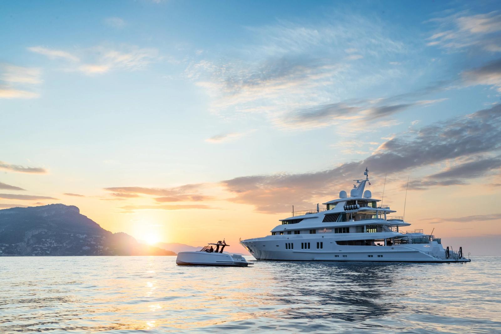 CORAL OCEAN at dusk with her tender
