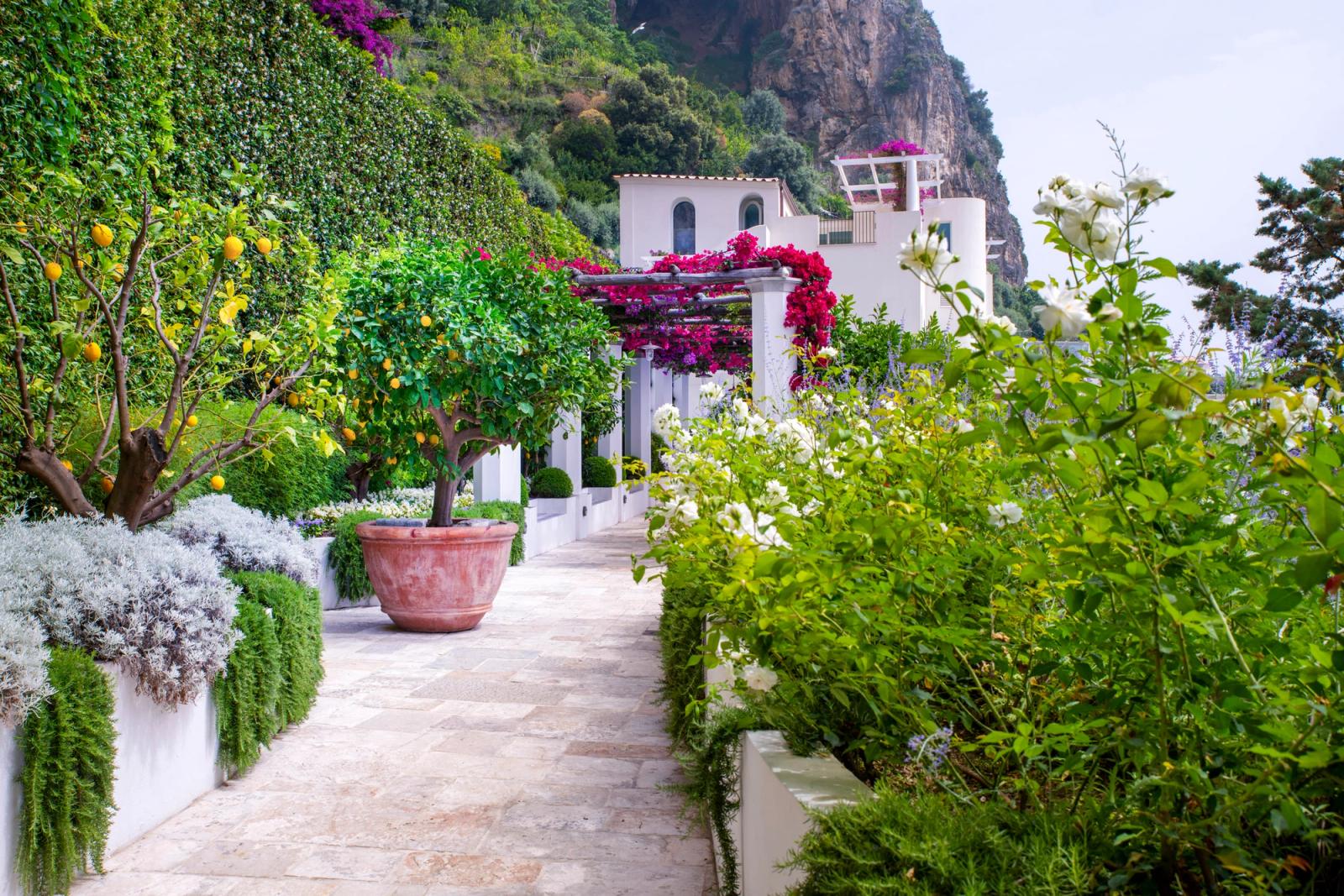 Terraced gardens threaded through the cliff face at Borgo Santandrea