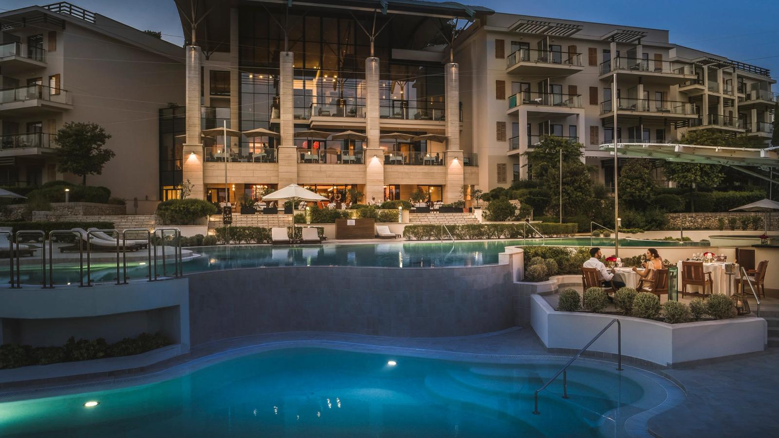 Monte Mulini and its pool at dusk