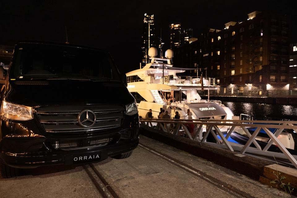 Luxury chauffeur service arriving at the Orraia yacht
