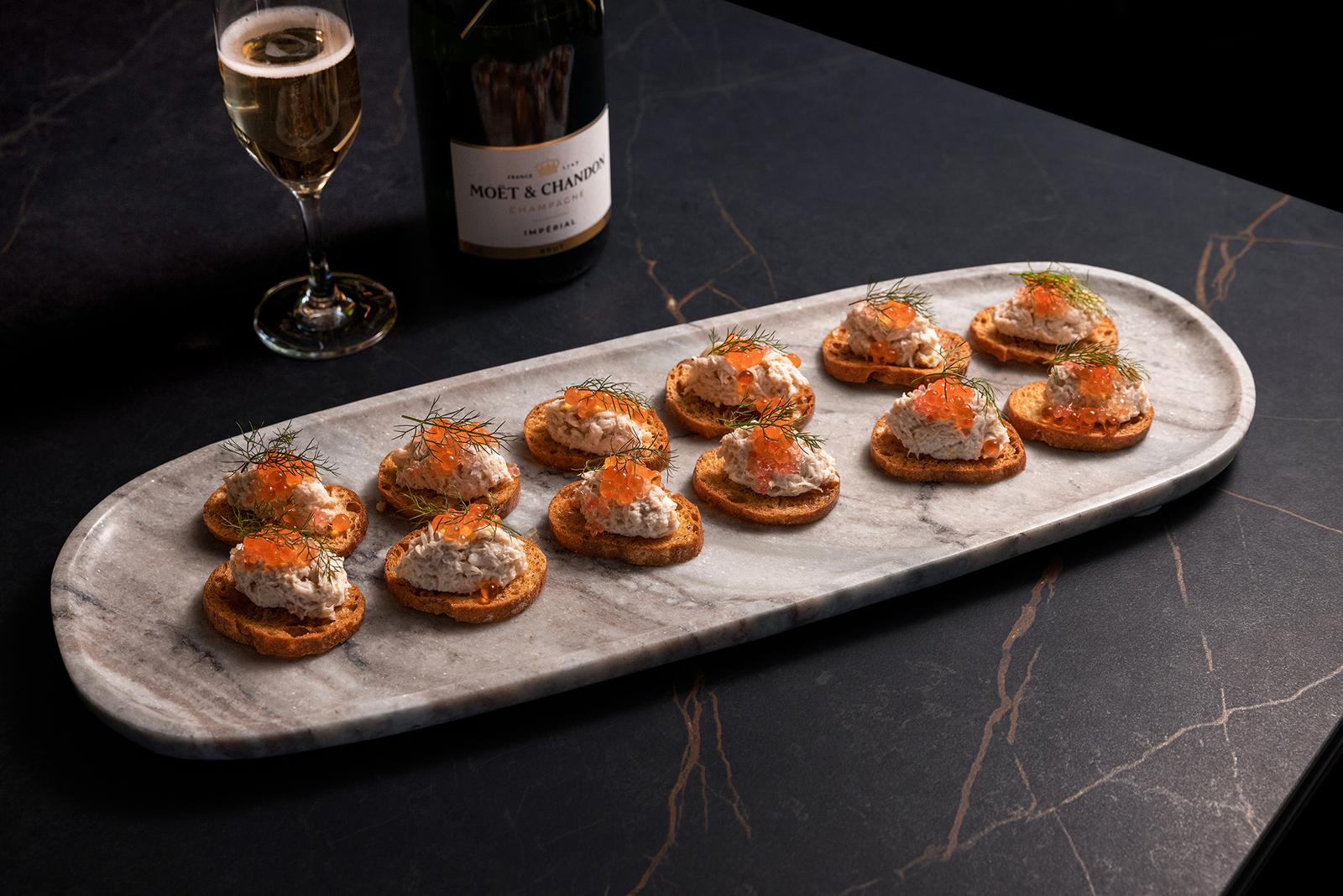 Canapés and champagne set for a reception