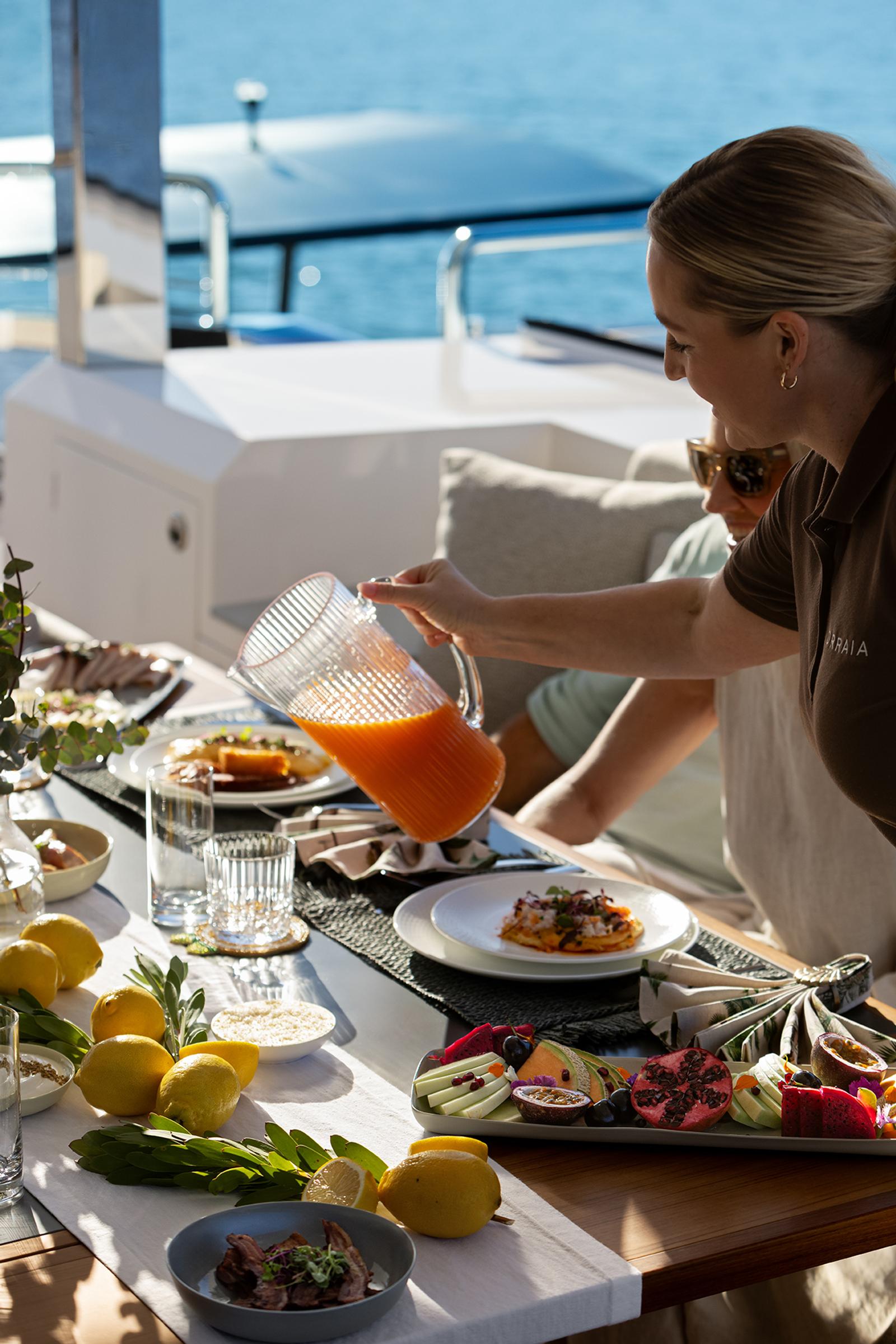 Lunch service laid out on deck at anchor