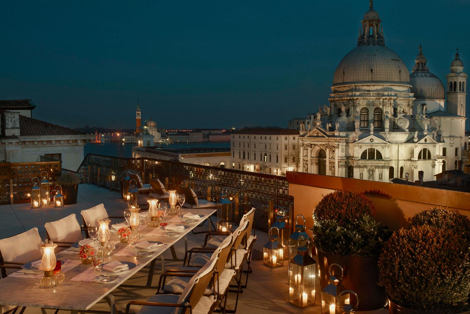 The Redentore terrace at night, the dome lit
