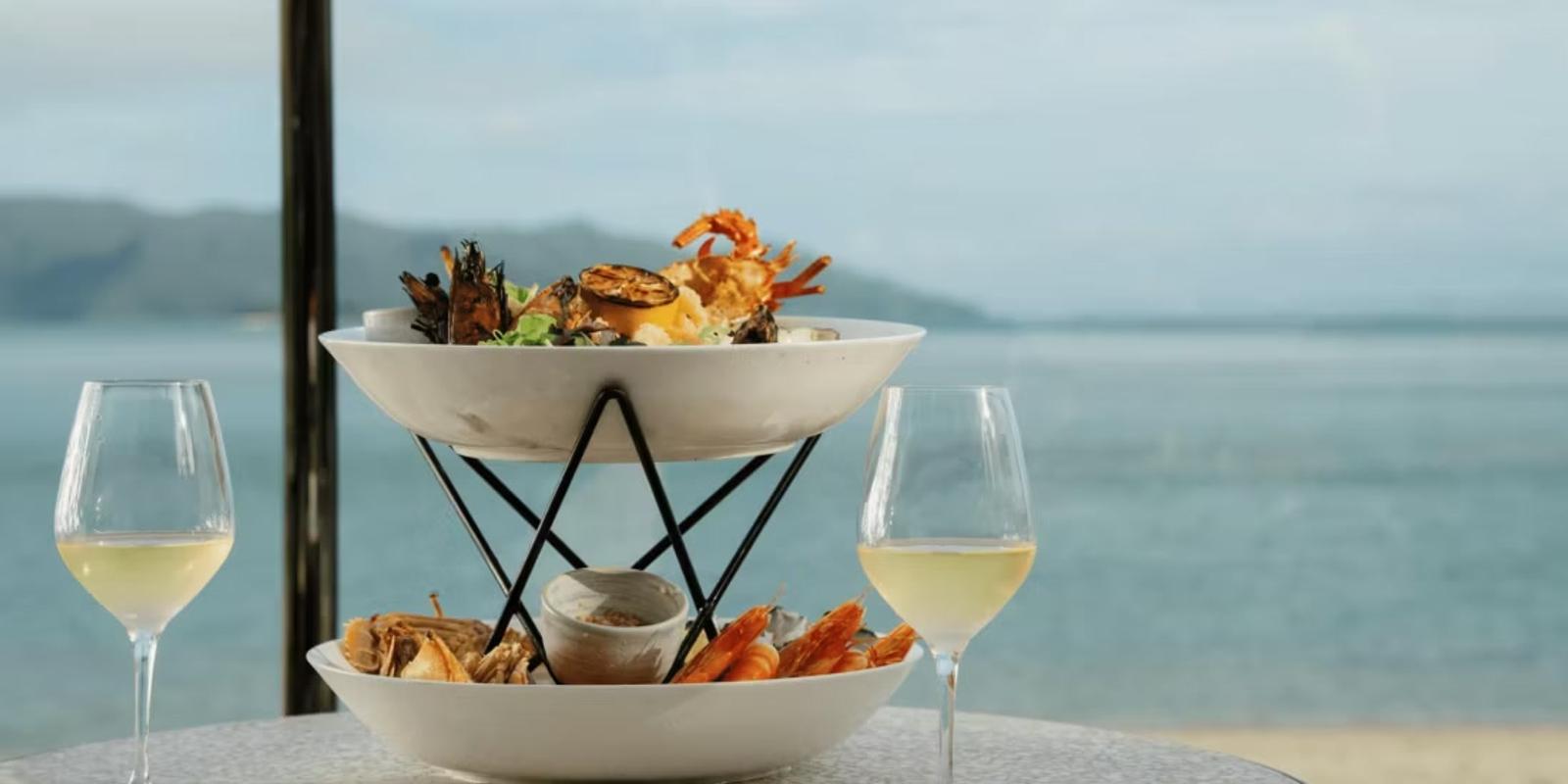Seafood platter and white wine by the beach