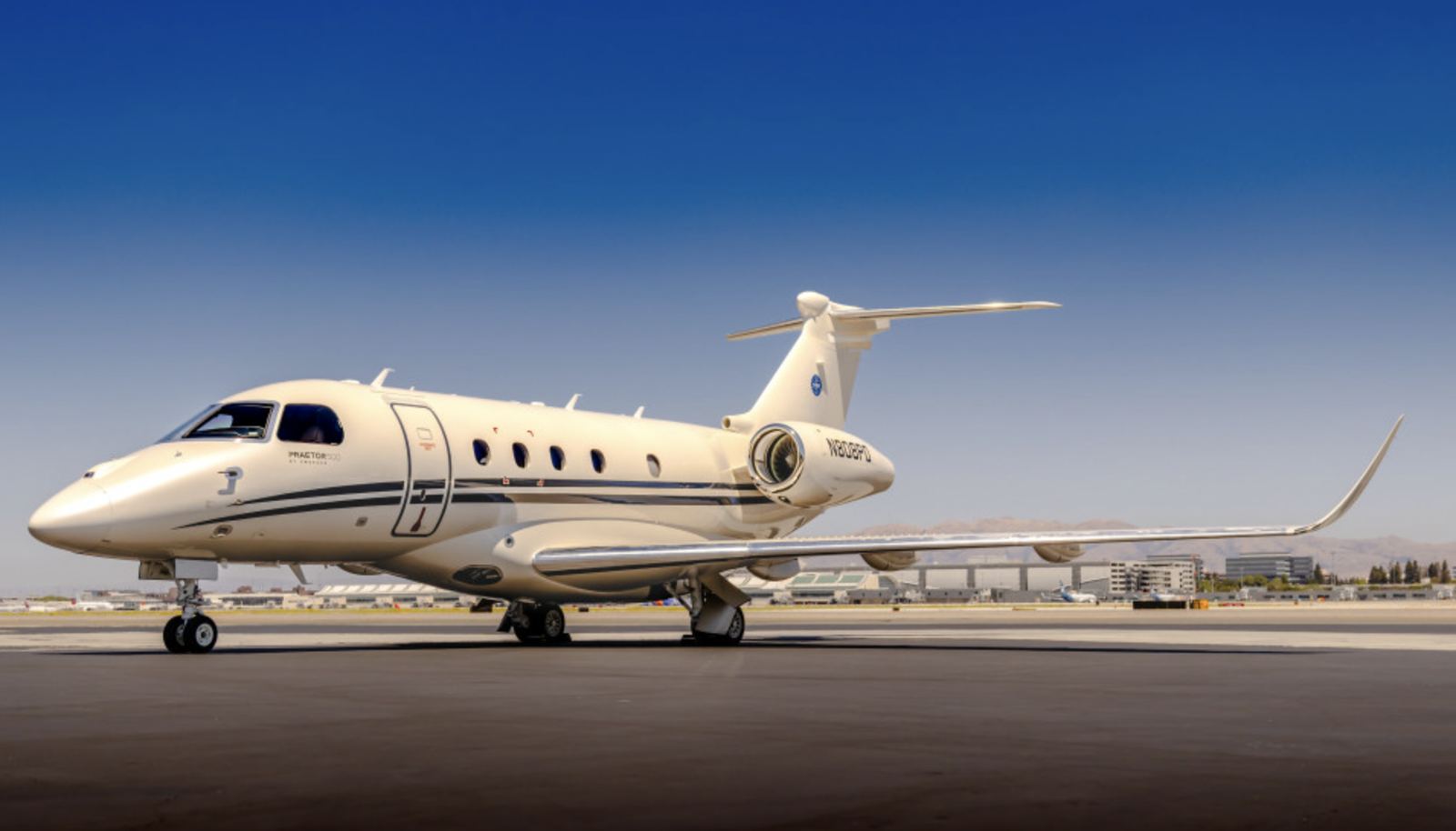 Embraer Praetor 500, a mid-size jet private jet available for charter with ORRAIA