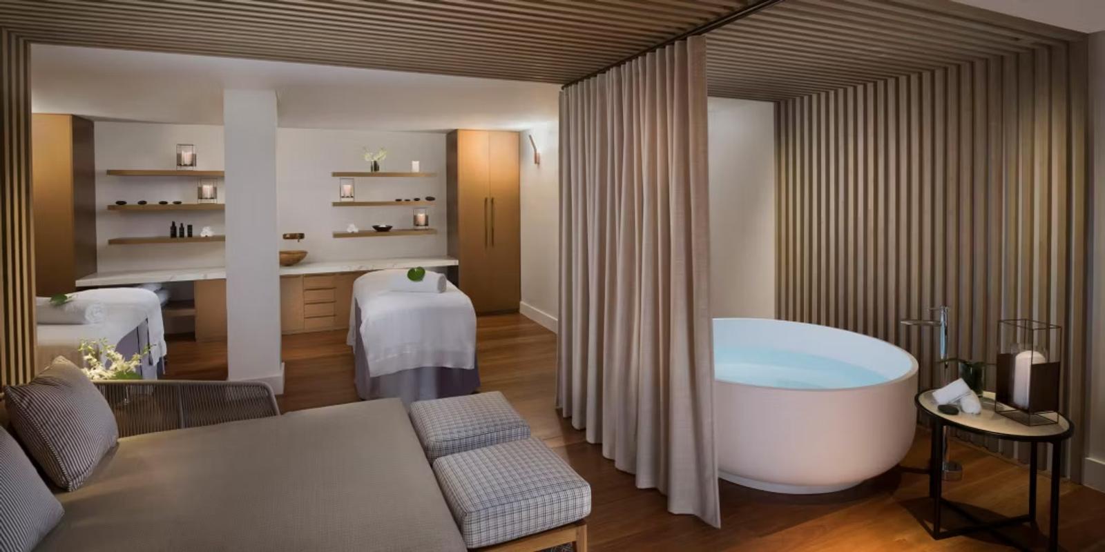 Spa treatment room with round bath