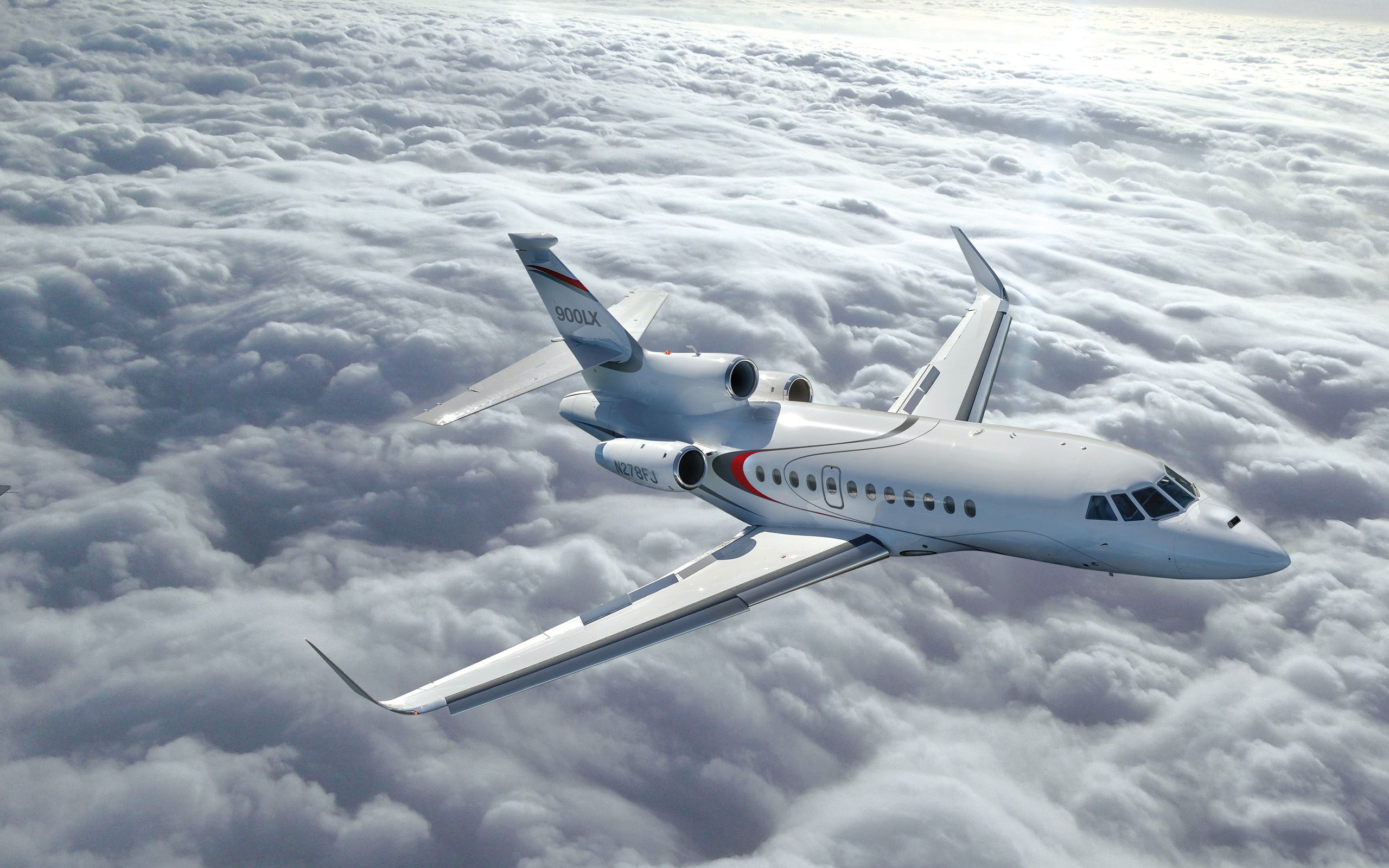 Dassault Falcon 900, a heavy jet private jet available for charter with ORRAIA