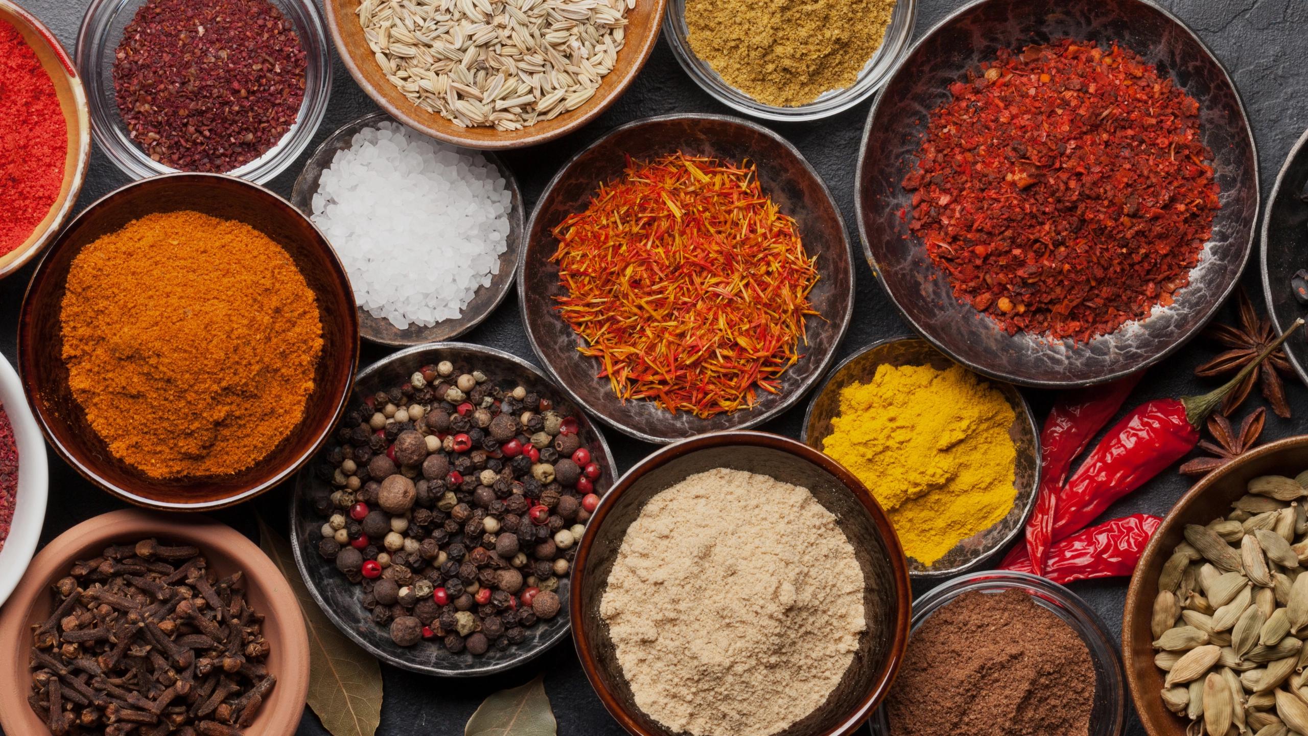 Assorted Indian spices displayed in small bowls