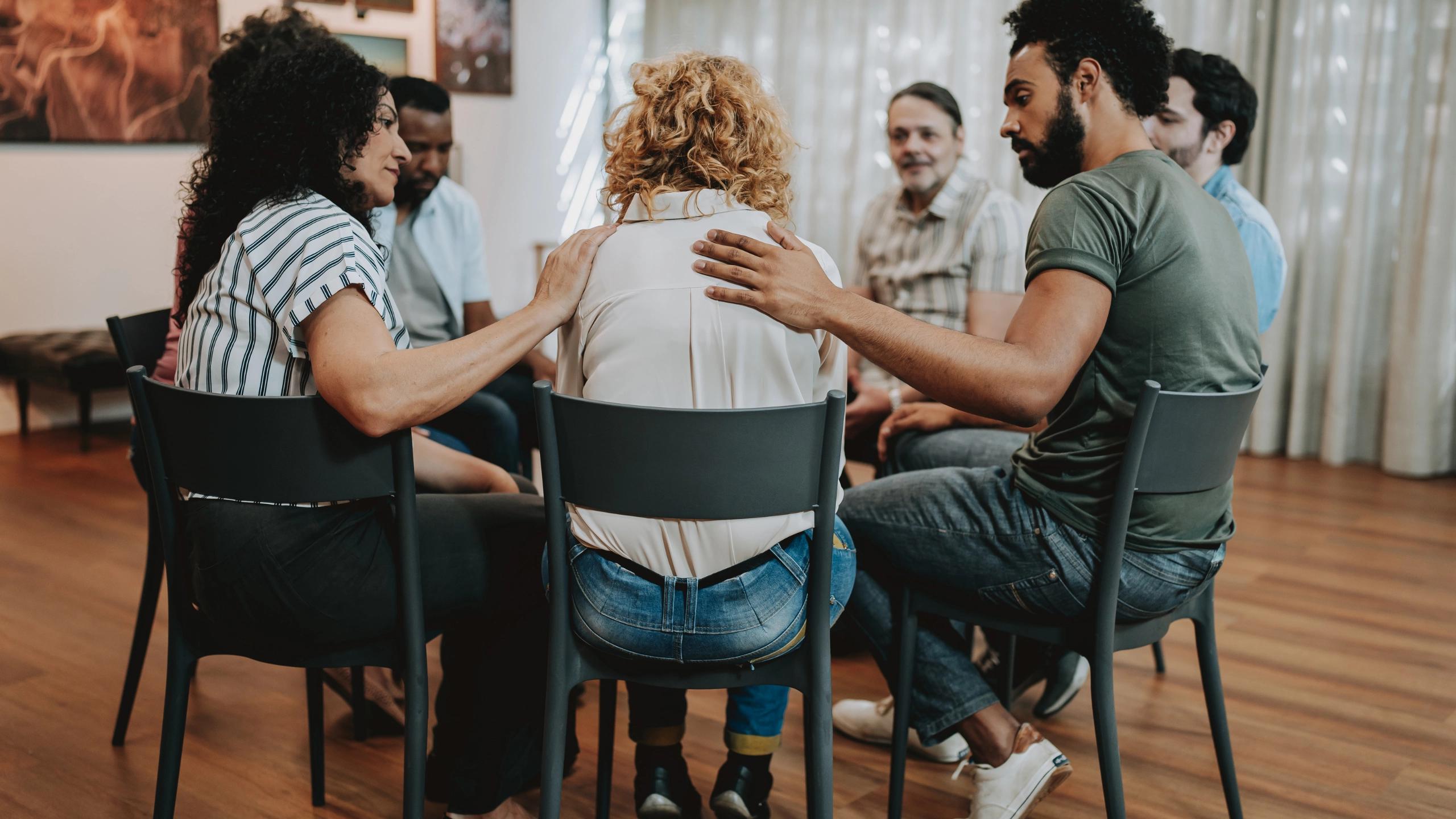 Support group sitting in a circle