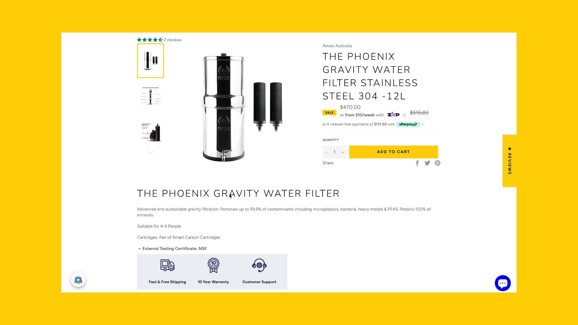 Stainless steel gravity water filter with two black carbon filters, displayed on a yellow background.