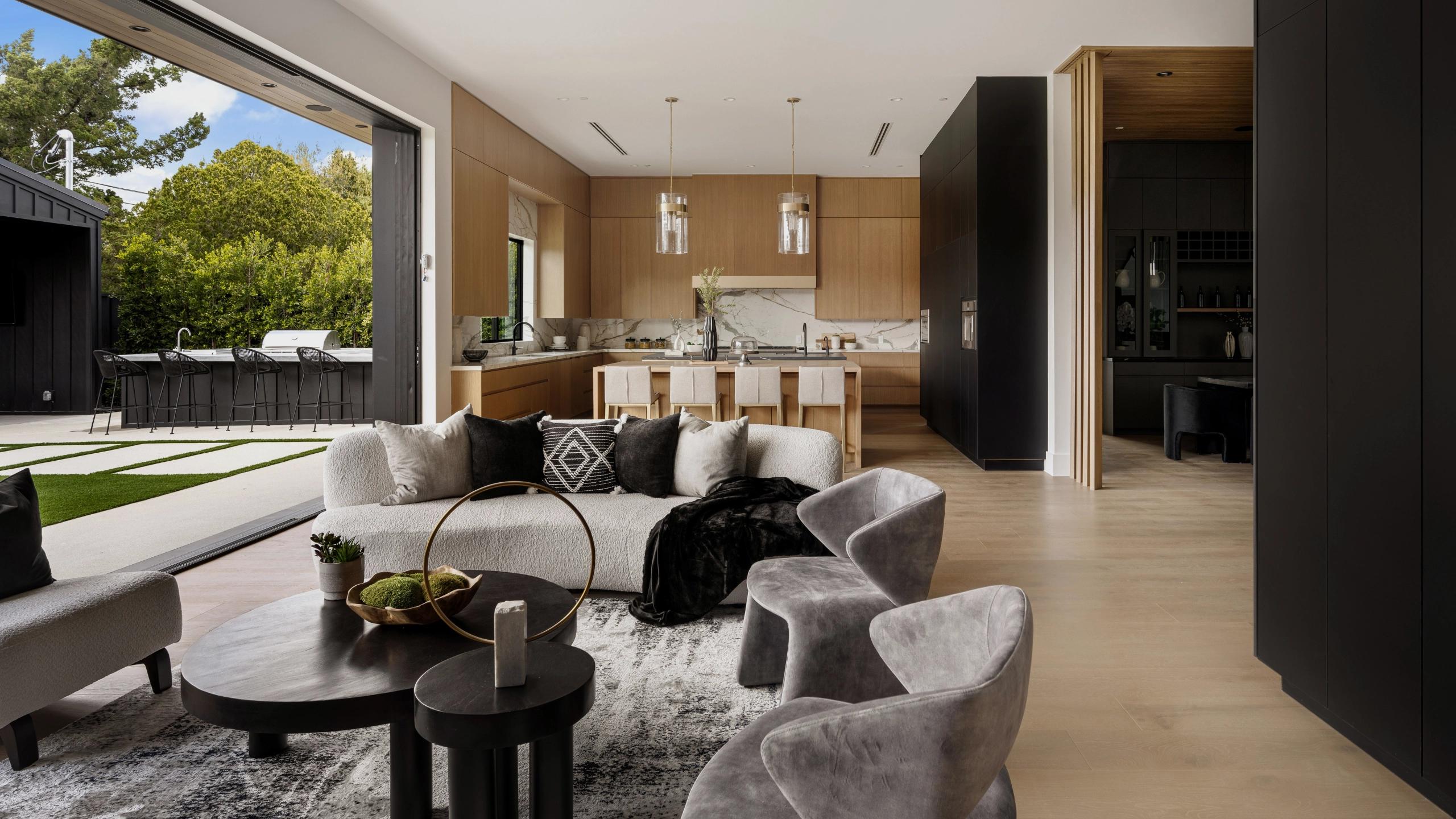 Open plan living room and kitchen in a Landsquare Homes design.