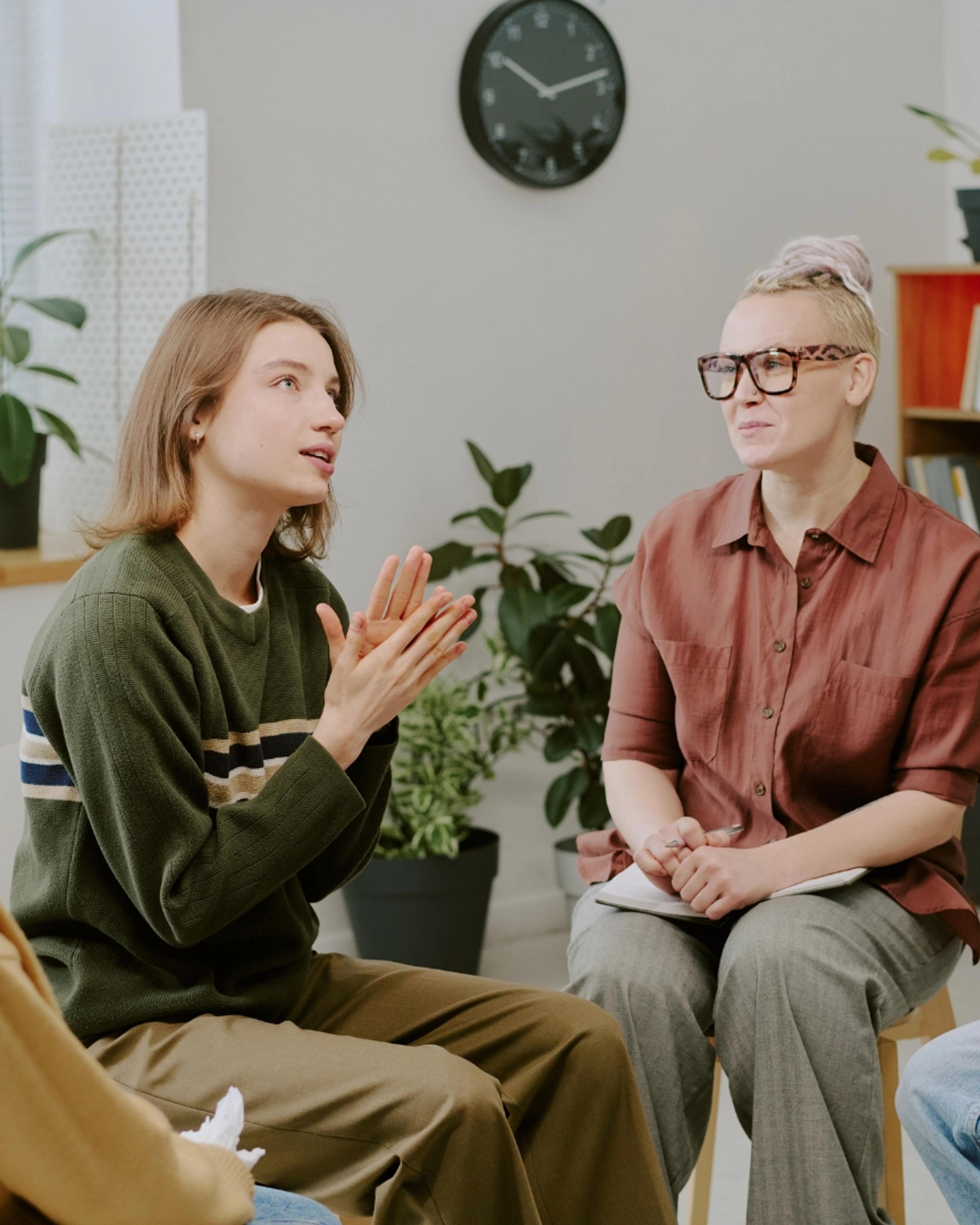 Norwest Clinic filler image two people discussing