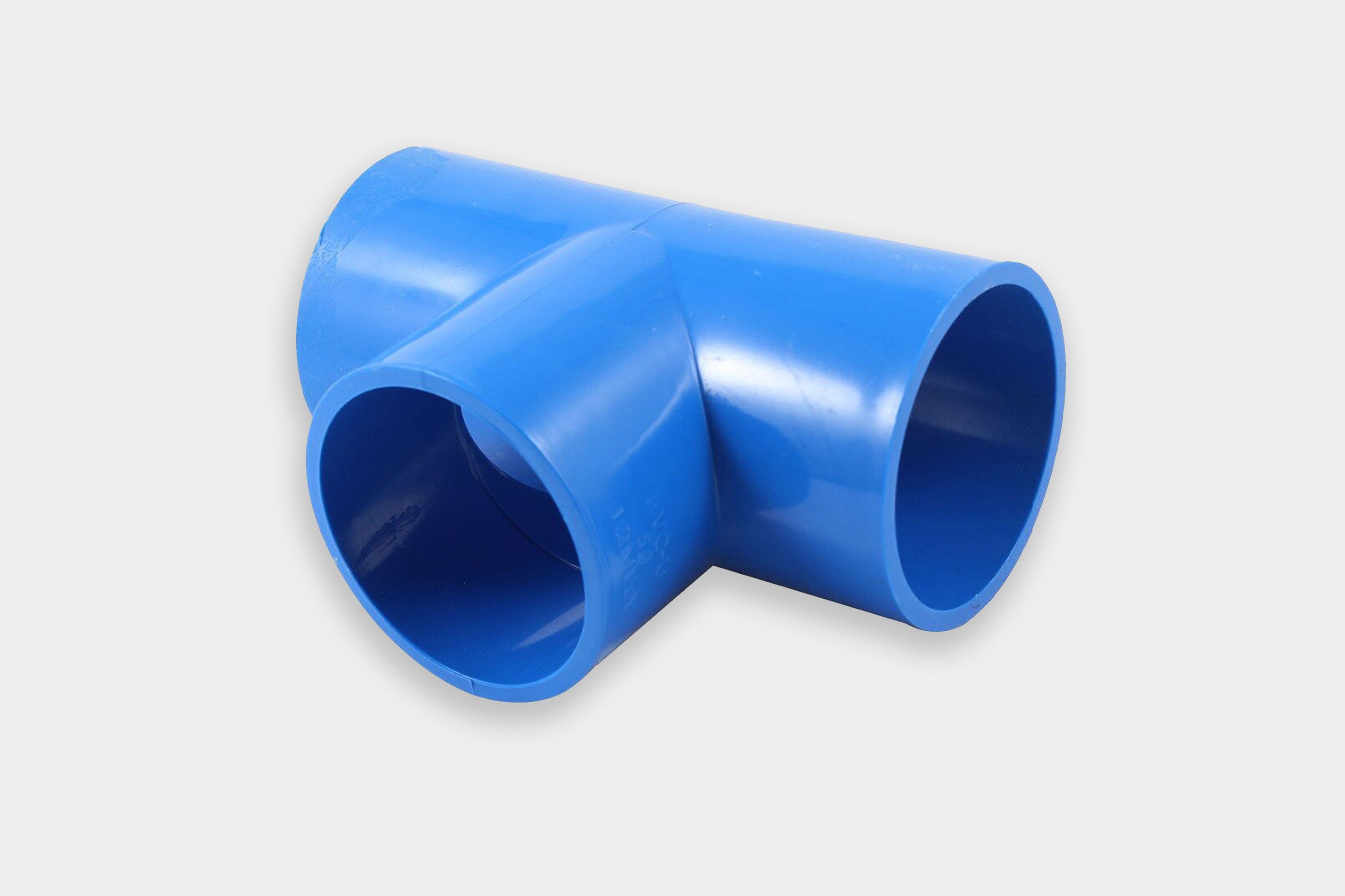 Blue PVC pipe connector in T shape