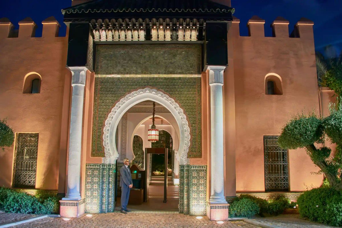 Elegant Moroccan wedding venue with traditional archways and floral decor