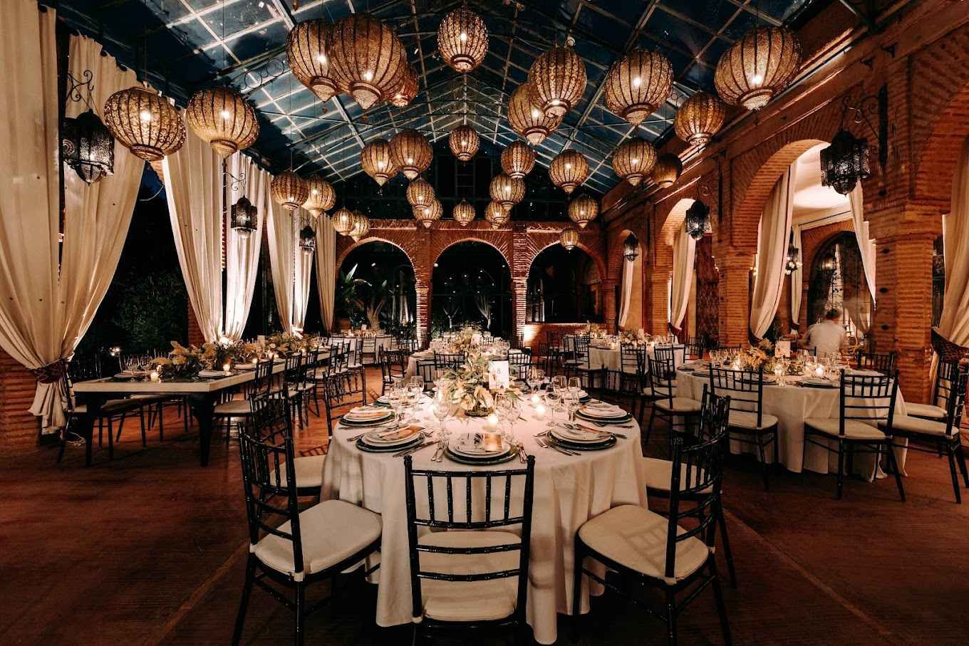 Luxury wedding planning team in Marrakech palace setting.