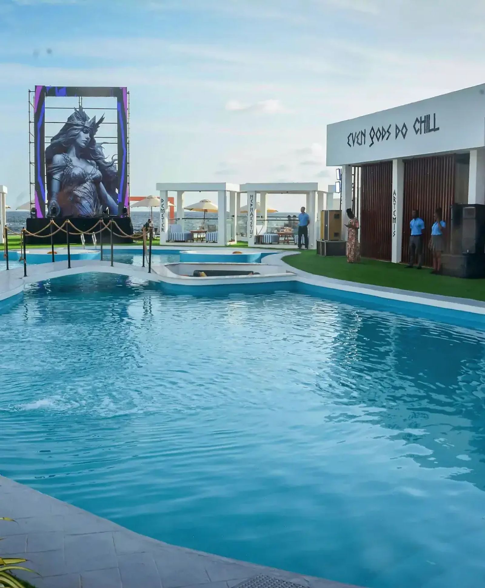 The Athena statue above the pool, the water still in front of it